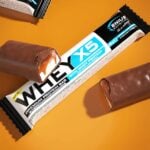Whey-X5 Protein Bar Coconut & Caramel – Traškus ir gardus baltyminis batonėlis | Genius Nutrition | 48 g