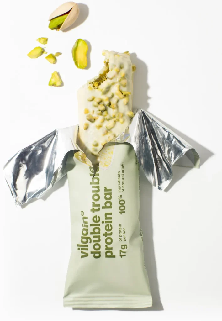 Double Trouble Protein Bar Pistachios – Traškus baltyminis batonėlis su pistacijomis | Vilgain | 55 g - Moksliškai pagrįstas veiksmingumas Double Trouble Protein Bar Pistachios – Traškus baltyminis batonėlis su pistacijomis | Vilgain | 55 g - produkto nuotrauka 2, FUNKCINIS MAISTAS ir Proteino Batonėliai ir Užkandžiai.