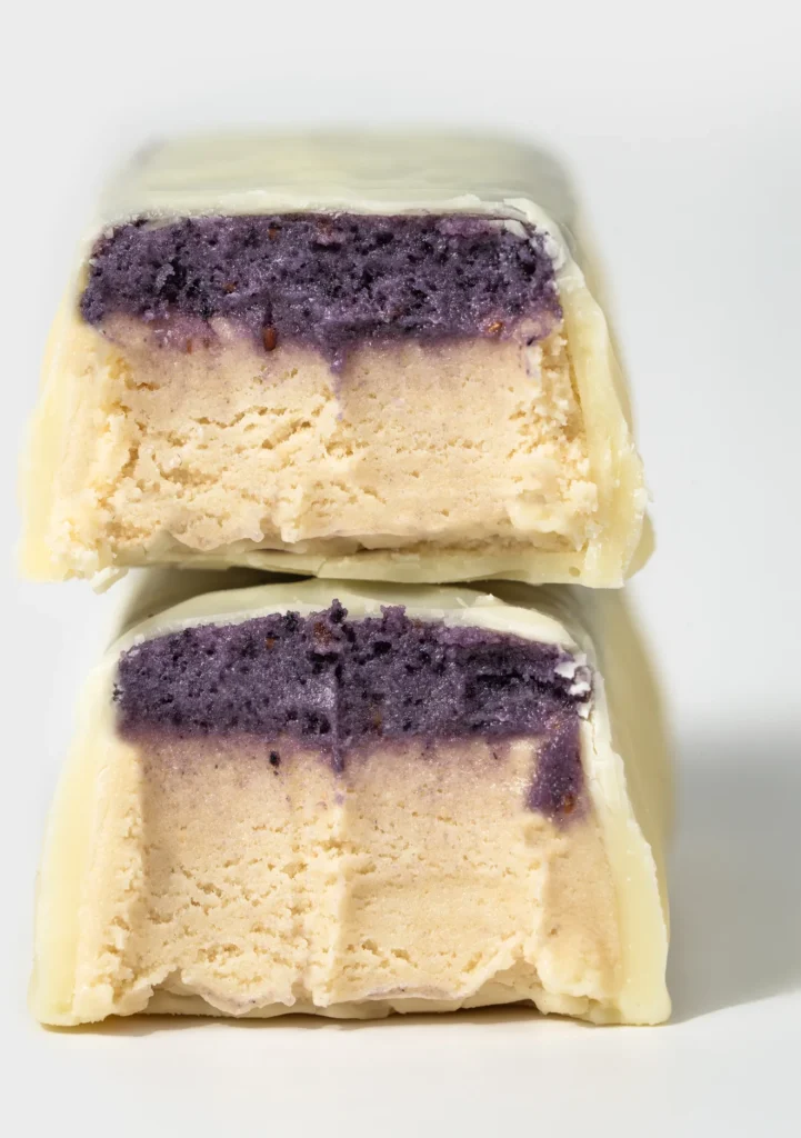 Double Trouble Protein Bar Blueberry Cheesecake – Traškus šilauogių pyrago skonio baltyminis batonėlis | Vilgain | 55 g - Moksliškai pagrįstas veiksmingumas Double Trouble Protein Bar Blueberry Cheesecake – Traškus šilauogių pyrago skonio baltyminis batonėlis | Vilgain | 55 g - produkto nuotrauka 3, FUNKCINIS MAISTAS ir Proteino Batonėliai ir Užkandžiai.