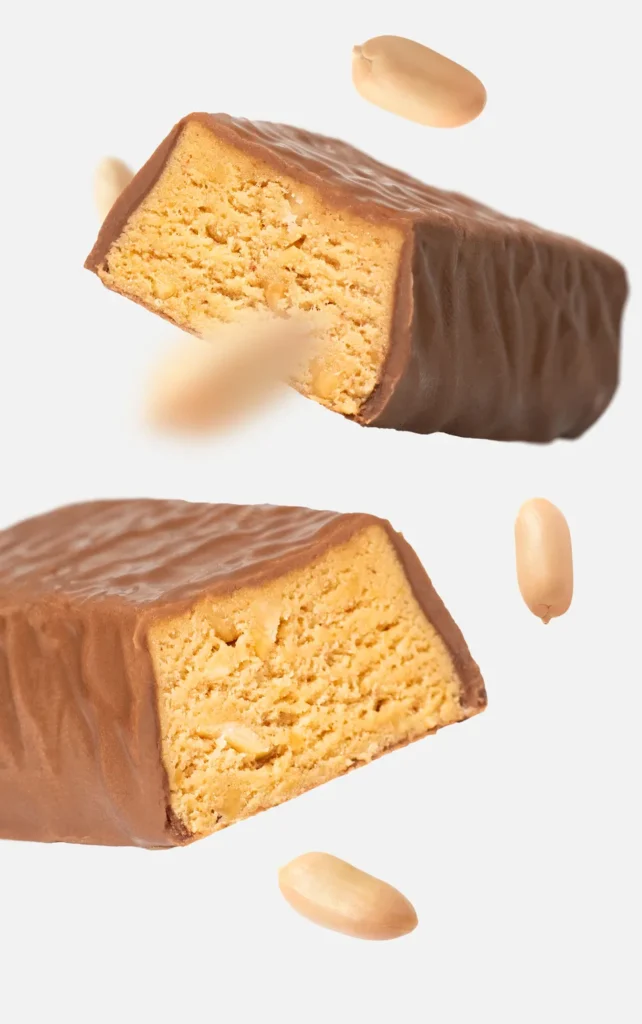 Trouble Protein Bar Peanut Butter Cups – Baltyminis batonėlis su žemės riešutų sviestu | Vilgain | 55 g - Moksliškai pagrįstas veiksmingumas Trouble Protein Bar Peanut Butter Cups – Baltyminis batonėlis su žemės riešutų sviestu | Vilgain | 55 g - produkto nuotrauka 2, FUNKCINIS MAISTAS ir Proteino Batonėliai ir Užkandžiai.